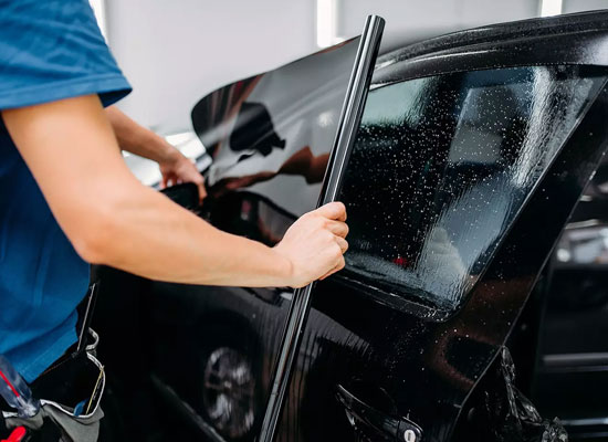 Window tint film installation — AutoFlow delivers tinting supplies and accessories to shops across Minnesota